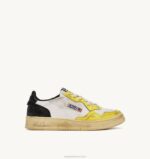 mulheres tênis cano baixo super vintage em couro branco preto e amarelo Autry 86XF202