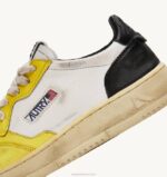 mulheres tênis cano baixo super vintage em couro branco preto e amarelo Autry 86XF202 - Image 6